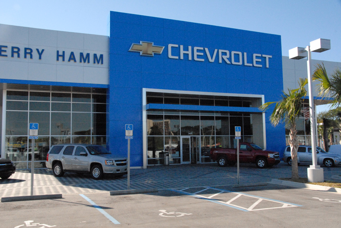 Car dealership storefront glass installation by Duval Glass & Mirror